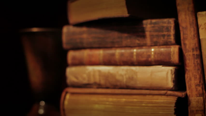 Ancient books in a bookshelf