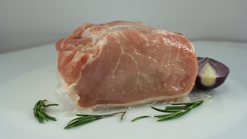 Pork meat with red onion and rosemary 
