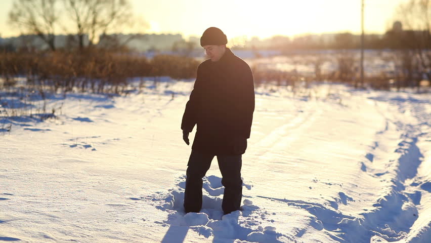 Young man outdoors winter fun. 