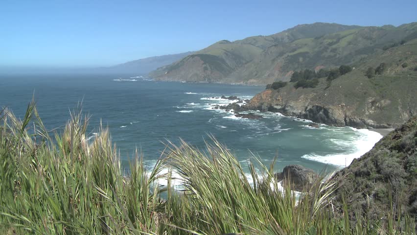 Scenic Pacific Coast including winding Highway 1 and cliffs.