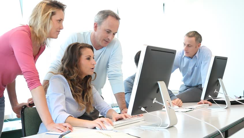 Office workers in business training