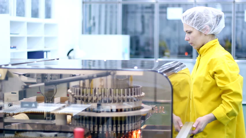 Preparing machine for work in pharmaceutical factory.  HD 1080p.