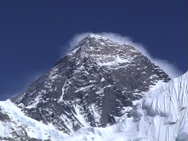 cloud blowing violently over mount Everest, Nepal, seen from the west.