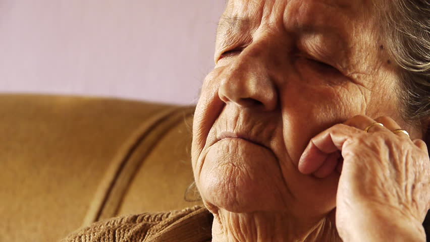 Senior old woman take nap sleep wrinkle skin 