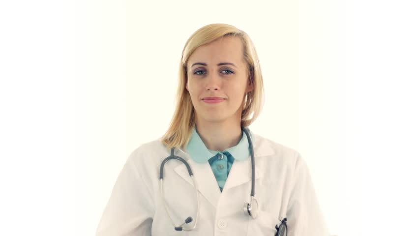 Female doctor offering pills in yellow and blue blister, isolated on white 