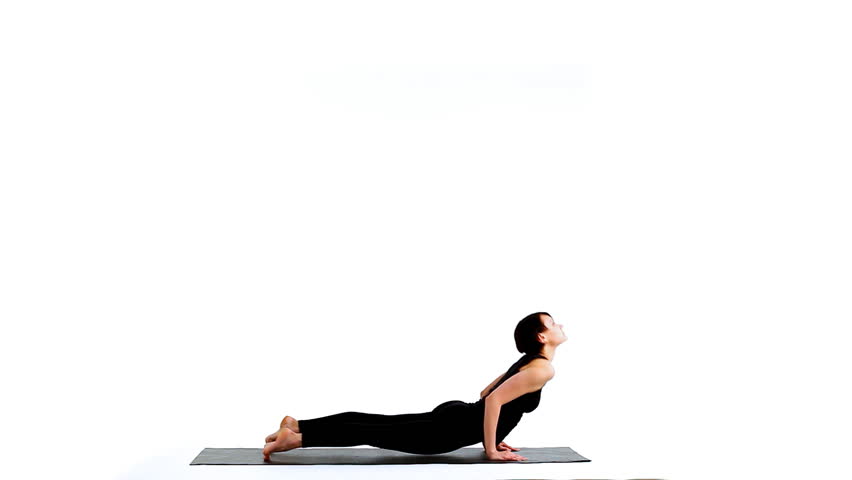 young beautiful woman exercises - sun salutation asana part3