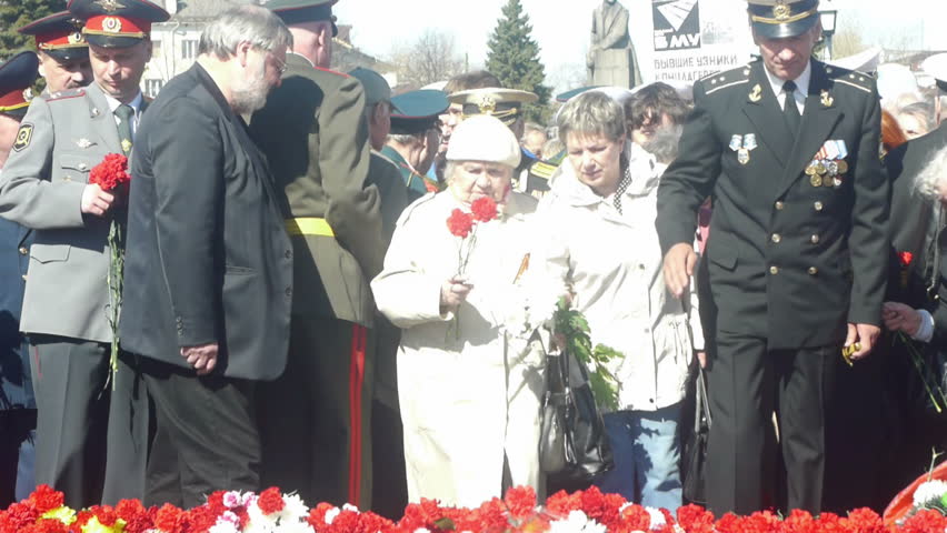 PETROZAVODSK, RUSSIA -MAY 09: Crowd of people lay flowers on the Victory Monument during Victory Day celebration in honor of the the 66th Anniversary of victory in World War II, May 09, 2011, Petrozavodsk, Russia. 