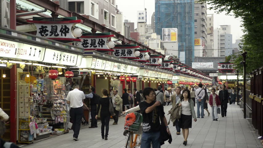 TOKYO - JUNE 04: Nakamise, a shopping street, June 04, 2011, Asakusa, Tokyo, Japan. For many centuries, Asakusa was Tokyo's leading entertainment district; Today, however, it is one of Tokyo's few districts which has preserved the atmosphere of old Tokyo.