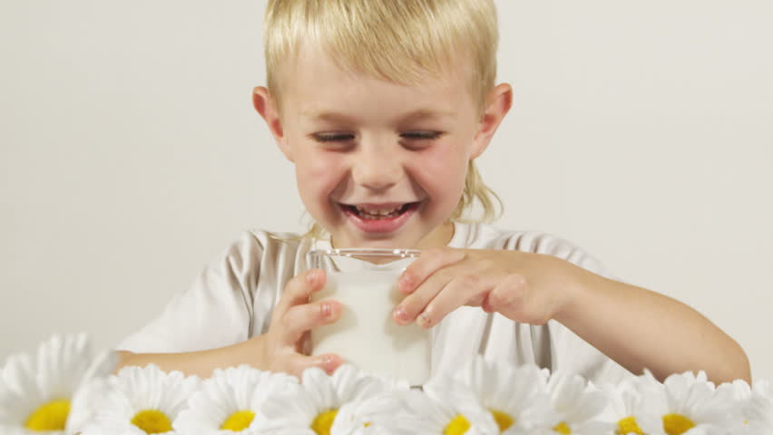 Boy drinking milk. 