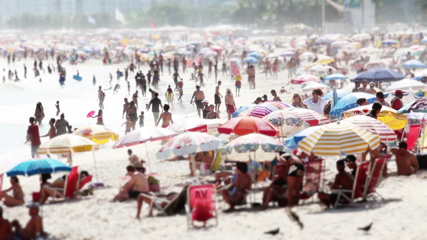 Sunbathers Lie In The Sand Of Copacabana Beach In Rio De Janeiro Brazil Stock Footage Video 1377