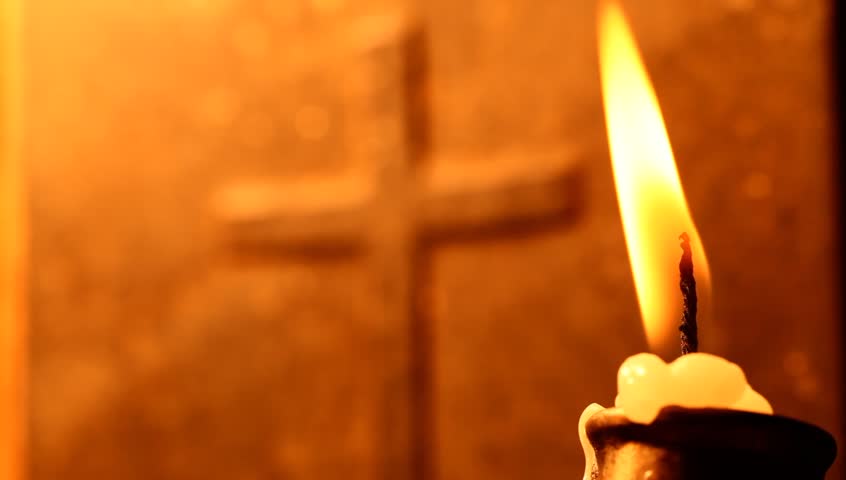 Holy cross with Candle