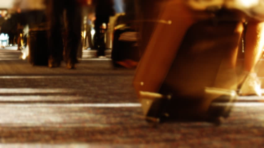 Timelapse of travelers in an airport