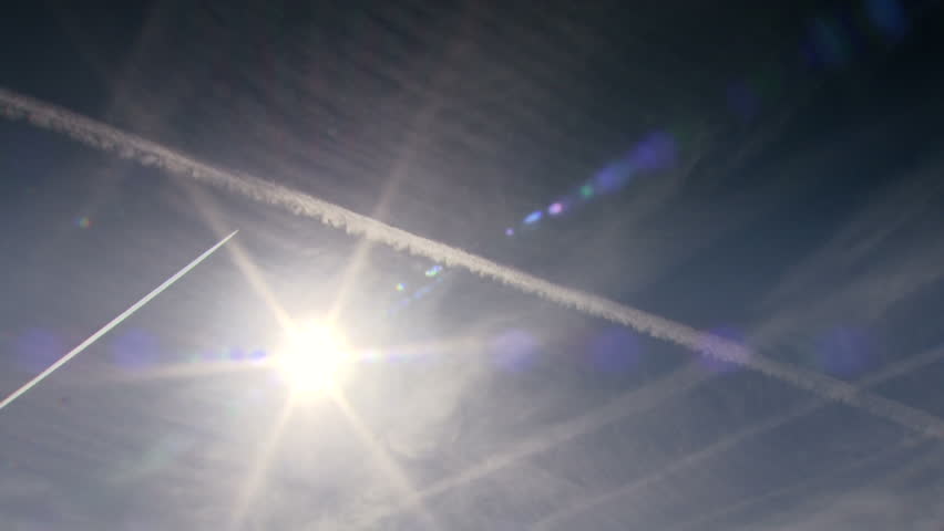 Condensation trails behind a plane.