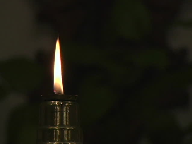 A warm candle brings peace to mind.
