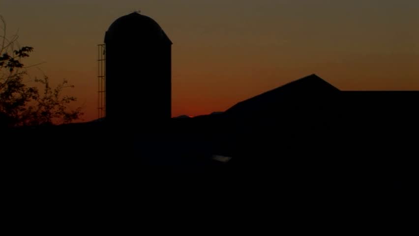 A beautiful time lapse over a barn in the countryside.