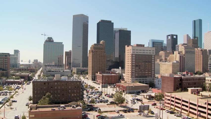 Slow pan across the Houston skyline on a bright sunny day.