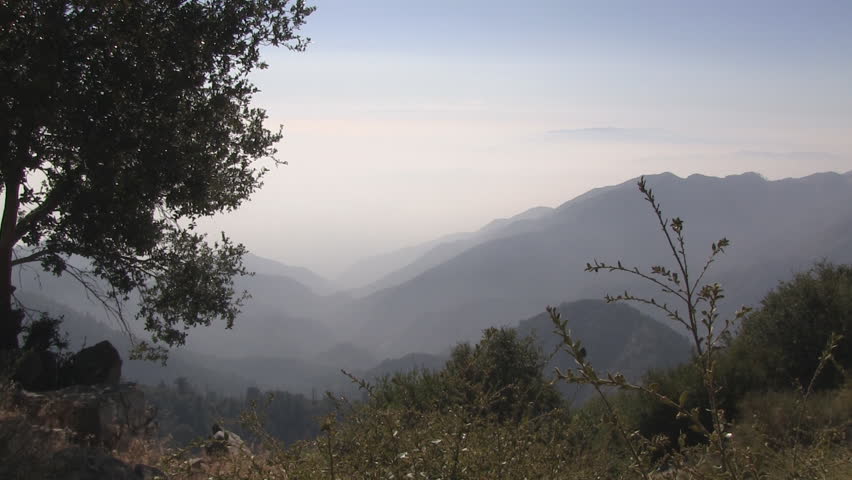 Zooming shot atop Mount Wilson showing thick smog. 