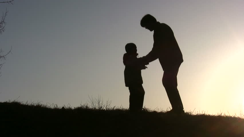 father rotate son sunset