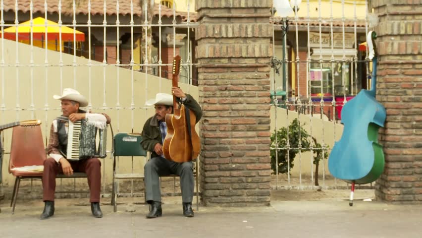 TIJUANA, MEXICO - CIRCA 2009: musicians chat in downtown circa 2009 in Tijuana Mexico