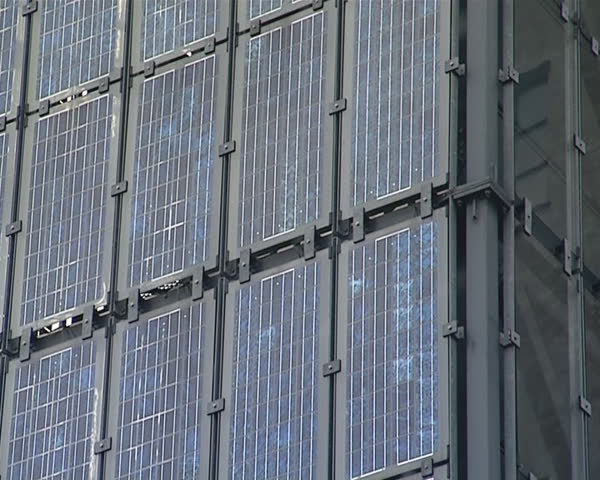 Lof of solar collectors installed on the building walls in Denmark.  Renewable energy. 