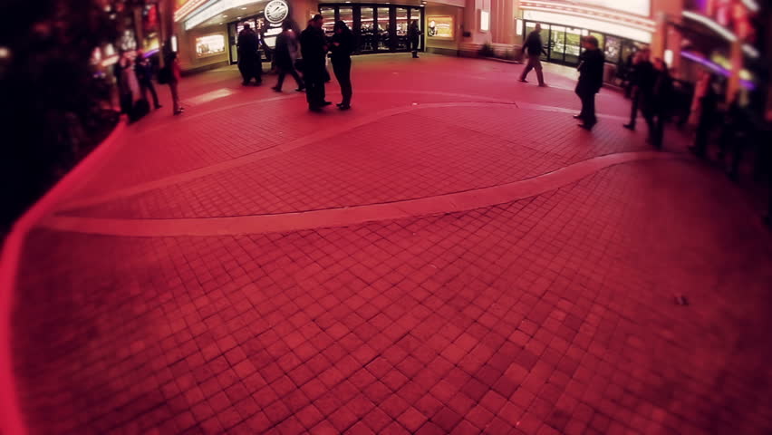 LAS VEGAS, NV - CIRCA SUMMER 2010: People walking in front of The Flamingo Hotel and Casino at night circa Summer 2010.