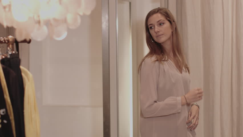 Pretty Blond Business Woman Getting Dressed For Work In Mirror Stock