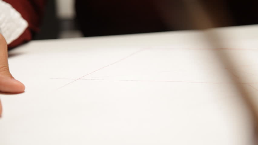Man draws a pyramid