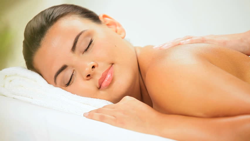 Beautiful Girl Enjoying Massage Treatment