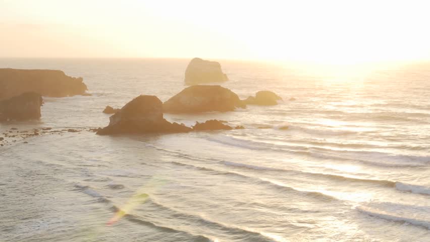 Time lapse of sun setting over the Pacific Ocean at Sand Dollar Beach in Big Sur, California.