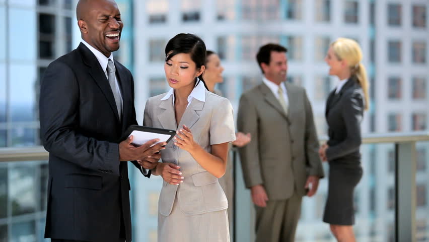 Young Multi Ethnic Business Team With Wireless Technology
