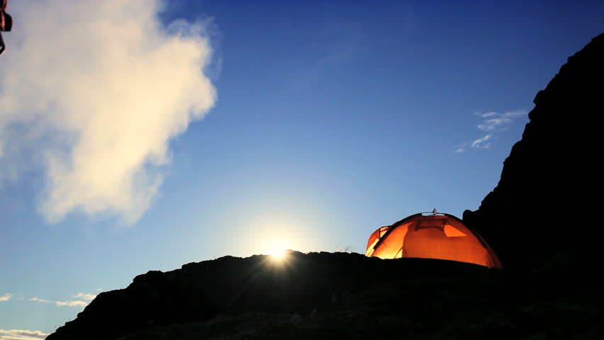Female Climber in Silhouette Watching the Dawn