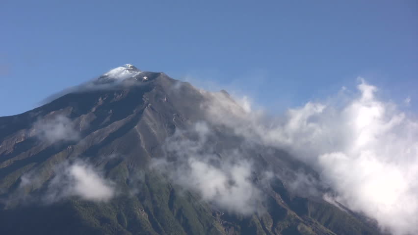 Clouds moving past the summit of Tungurahua Volcano, Ecuador