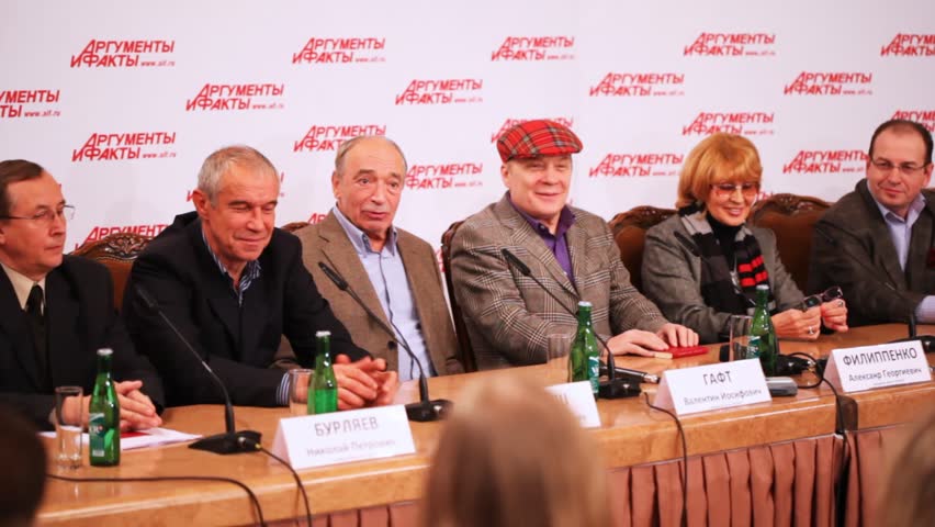 MOSCOW - DECEMBER 2: Popular actors give interview about film Master and Margarita sitting at table in press private residence Arguments and Facts on December 2, 2010 in Moscow, Russia. 