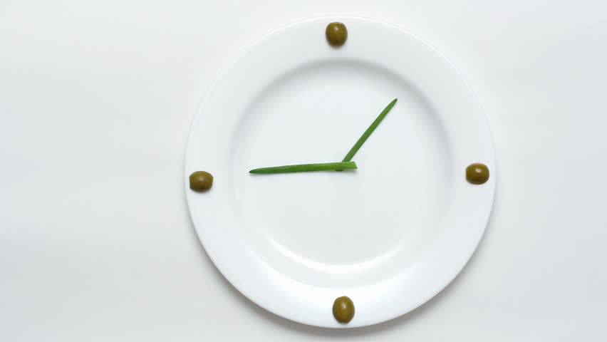 Olives, green onions, a plate - clock 