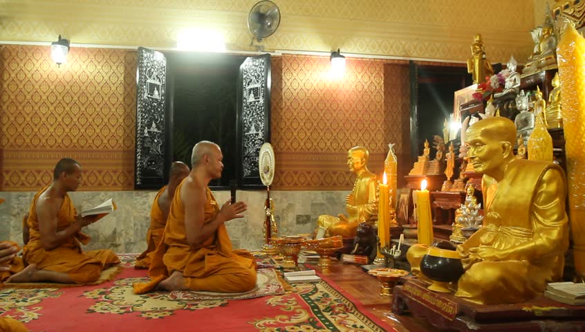 KOH CHANG, THAILAND - DECEMBER 5: Recitation of mantras by monks in a Buddhist monastery Wat Klong Prao, on the occasion of the birth of King of Thailand, December 5, 2011 in Koh Chang, Thailand.