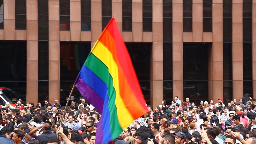 SAN PAULO, BRAZIL - CIRCA JUNE 2011: Crowds celebrate the LGBT Gay Pride Parade on Avenida Paulista circa June 2011 in San Paulo.