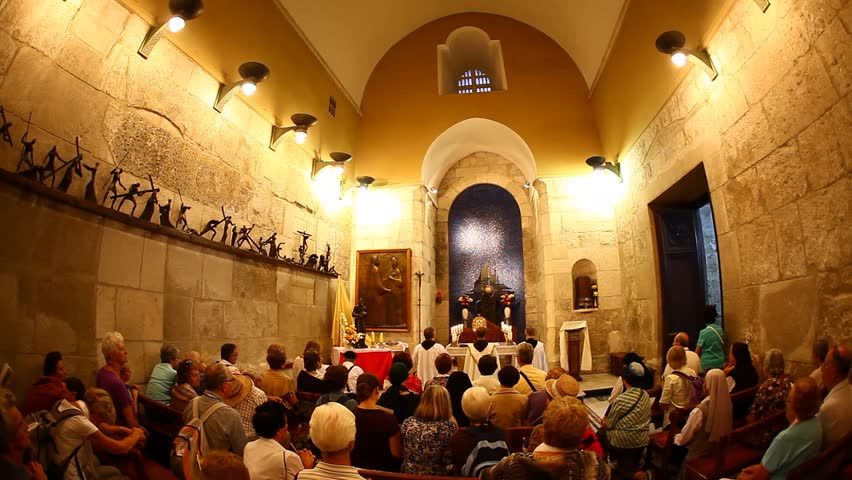 JERUSALEM, ISRAEL - CIRCA OCT 2011: Mass is held in the Church of the Holy Sepulchre circa October 2011 in Jerusalem.