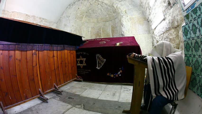 JERUSALEM, ISRAEL - CIRCA OCT 2011: A worshiper prays at King David's Tomb circa October 2011 in Jerusalem.
