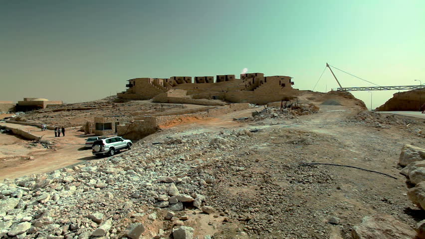 the Beresheet Hotel under construction on the edge of the Mitzpe Ramon Crater in Israel. The building is being built to blend with the natural desert surroundings of Israel.