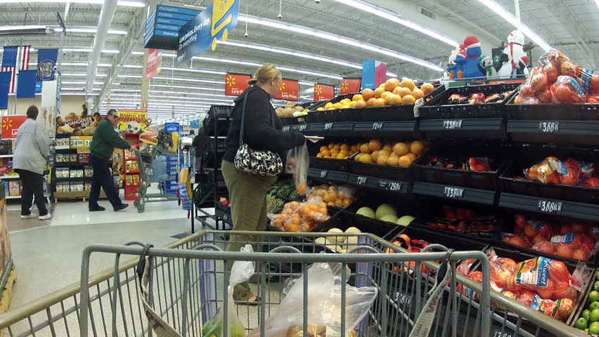 EPHRAM, UT - DEC 13 - Consumers purchase goods at Walmart during the busy holiday season December 13, 2011 in Ephram, Utah.