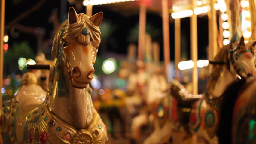 Pony rides on a merry-go-round carousel