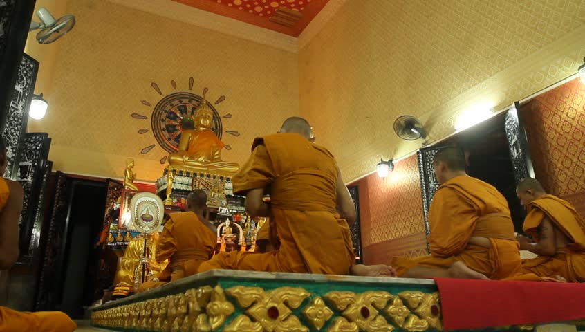 KO CHANG, TRAT/THAILAND - DECEMBER 5: Recitation of mantras by monks in a Buddhist monastery Wat Klong Prao on December 5, 2011 in Ko Chang, Thailand. On the occasion of the birth of King of Thailand.