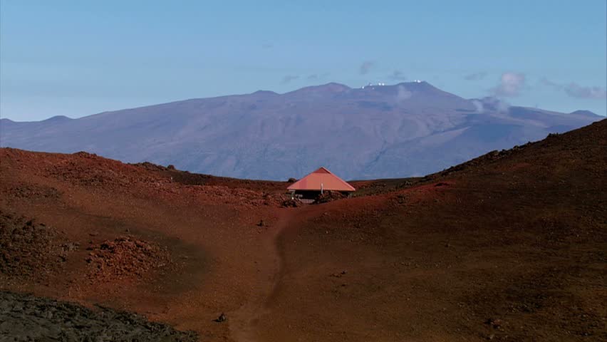 Aerial of remote ranger station and Mauna Kea in background, Hawaii