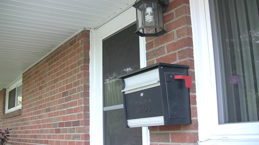 Getting the mail out of the mailbox.  Very excited.