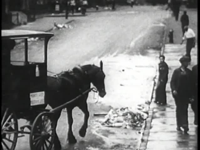 Milkman delivering milk in bottles, New York City, 1930s