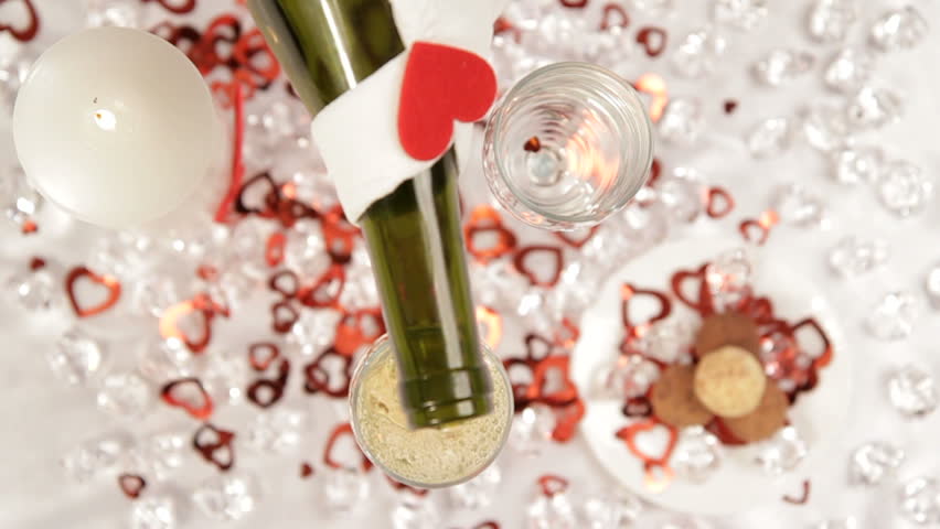 Beginning of the holiday. In the beautiful festive glasses poured champagne.