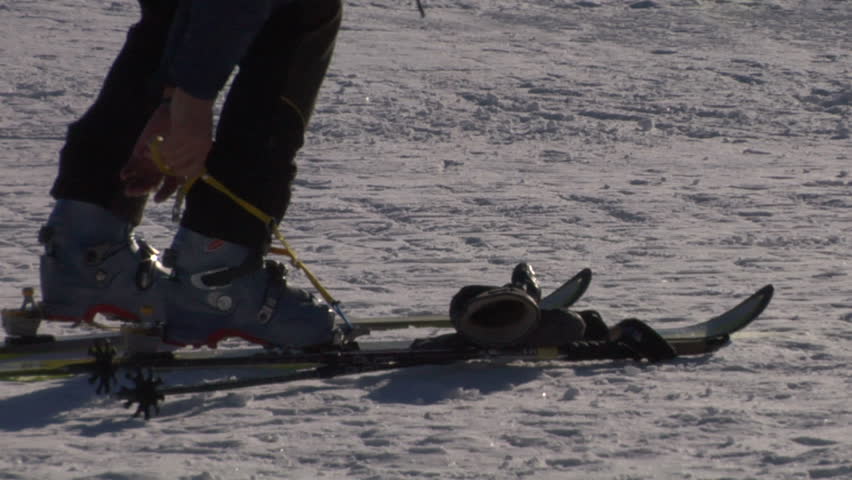 Getting ready for skiing - fastening the boots