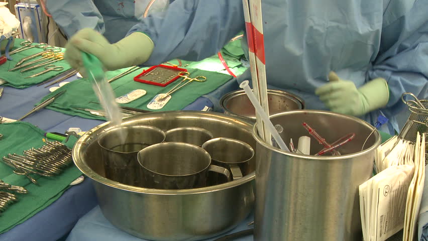 Surgical technician works with supplies