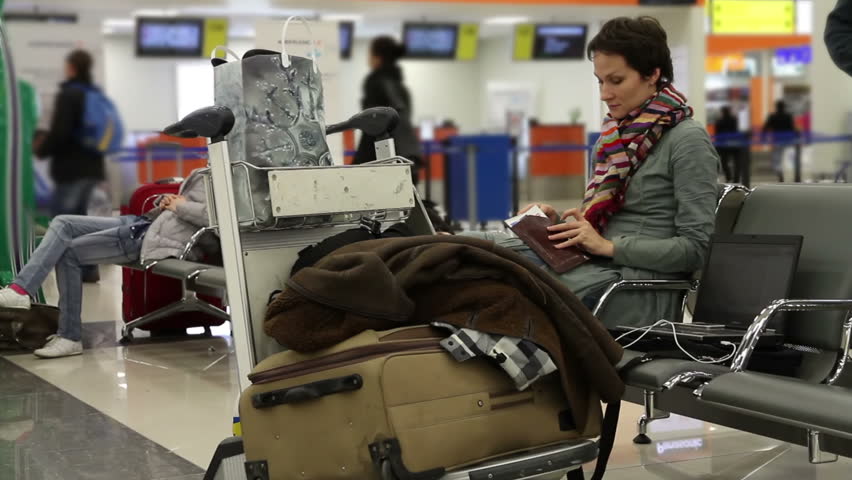 Waiting room. Woman sitting in airport lounge