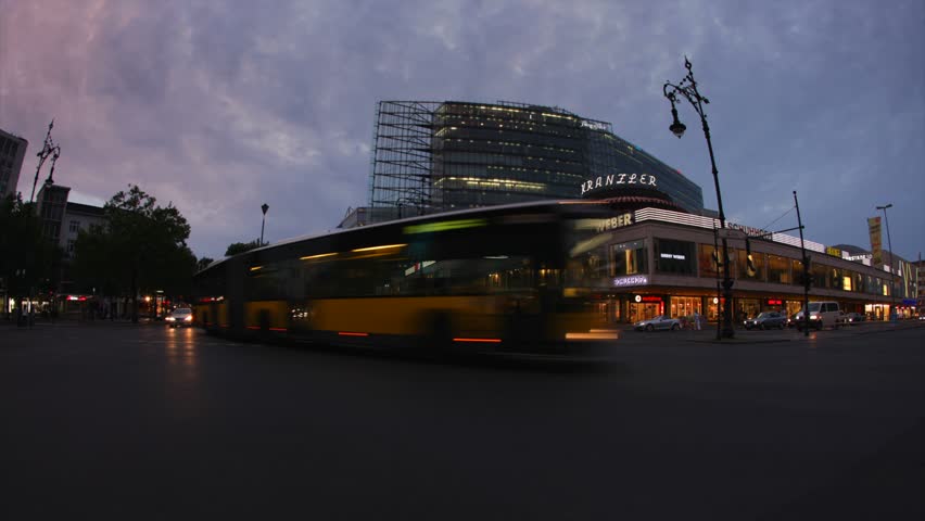 BERLIN, GERMANY, CIRCA 2011: (Time lapse view) Cars drive past Berlin KurfÃ¼rstendamm (Kudamm) during sunset circa 2011 in Berlin, Germany.